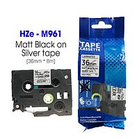 BROTHER HZe-M961 ເທບປ້າຍ (36mmx8m; Black on silver)
