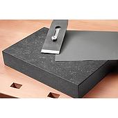 Why are granite tabletops less prone to deformation than metal tabletops?