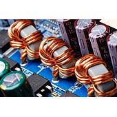 What is the difference between a capacitor and an inductor?