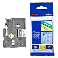 BROTHER TZE-521 ປ້າຍກຳກັບ (9mmx8m, black on blue)